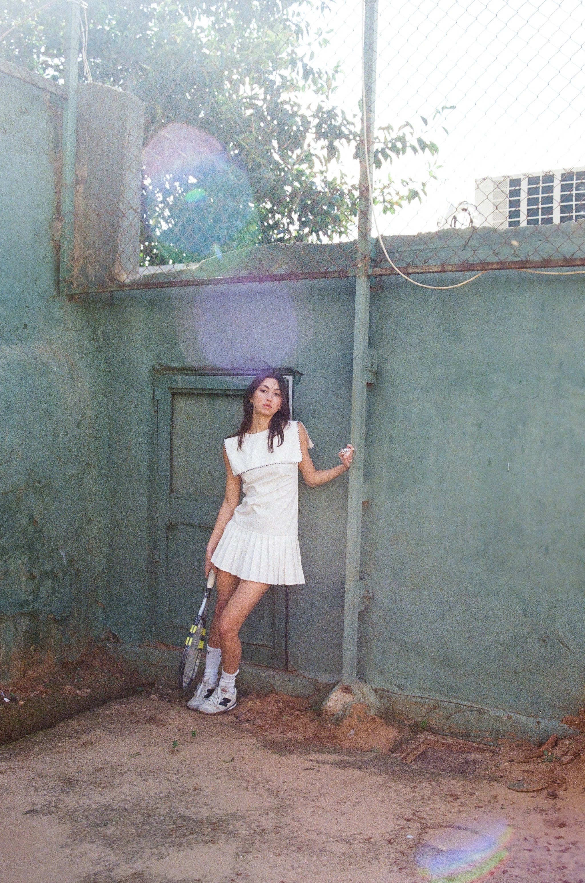 White vintage tennis dress with pleated skirt