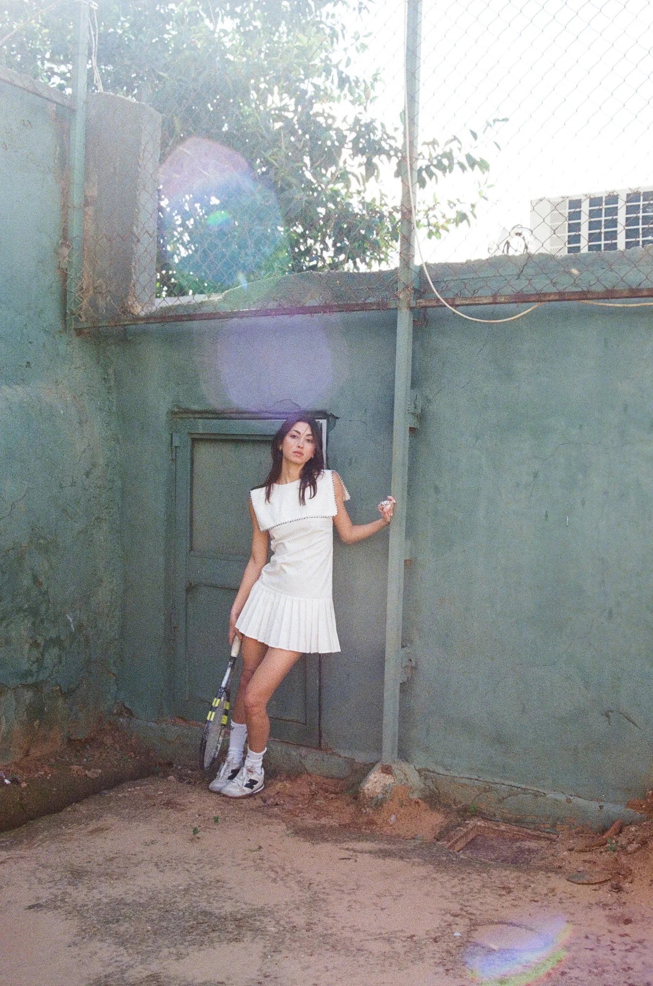 White vintage tennis dress with pleated skirt